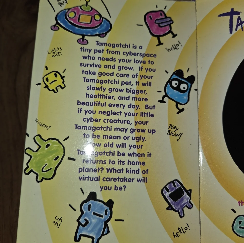 1996-97 Bandai Tamagotchi Virtual Reality Pet #1800 Red w/Yellow Buttons NOS - Picture 3 of 4